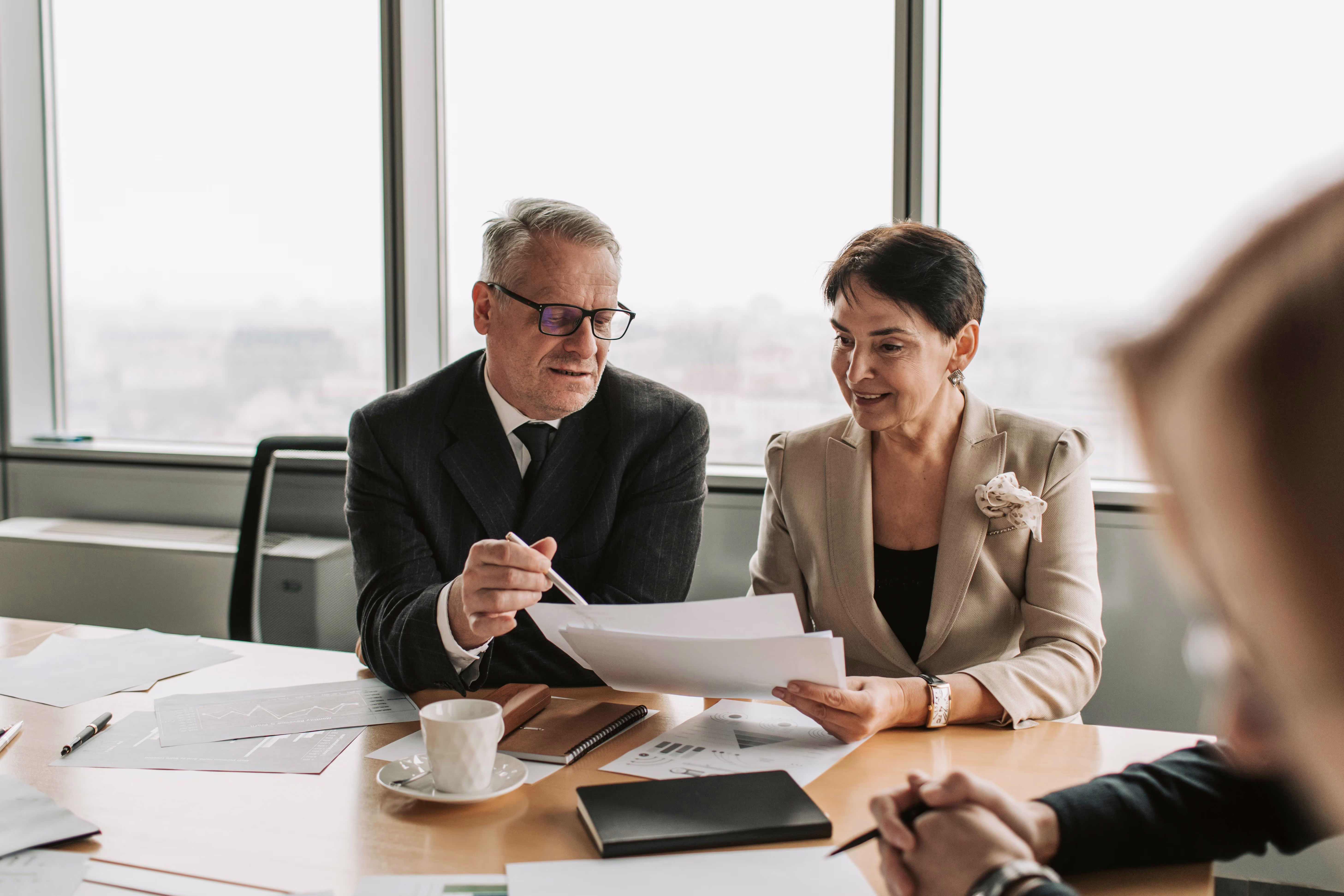 Professional auditor reviewing financial documents